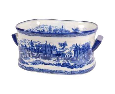 A reproduction blue and white ceramic 2-handled foot bath, with printed scenes, 45cm overall