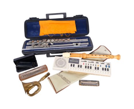 A group of musical instruments, including a Hernals model S100 silver plated flute, cased, a Vintage Casio VL-Tone electronic