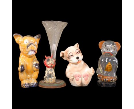 A metal and glass Studdy Dog, circa 1920s, a glass dog bottle with George VI Coronation transfer, and 2 later ceramic Bonzo d