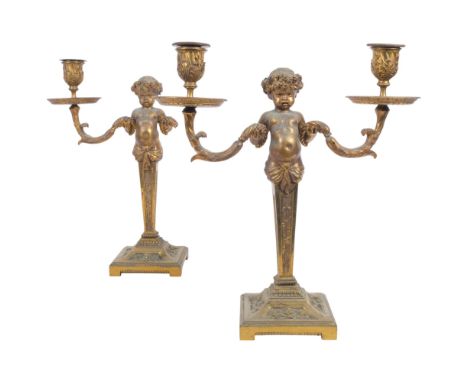 A pair of Vintage gilt-brass twin-branch candelabra with cherub figures on square embossed plinths (1 A/F), H35cm