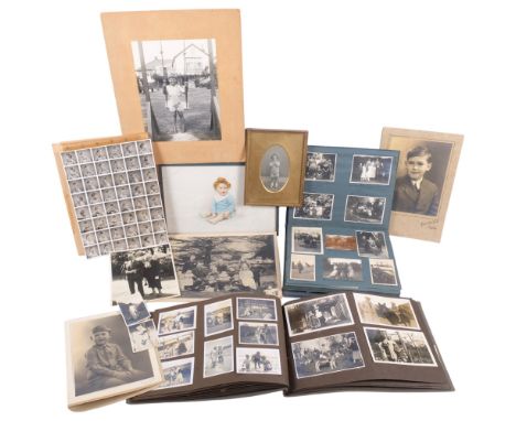 2 Vintage 1920s and 1930s family photograph albums, a watercolour portrait of a child by Gordon Chase, etc