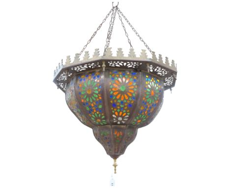 A large brass Moroccan style ceiling light with inset glass floral panels, approx 47cm