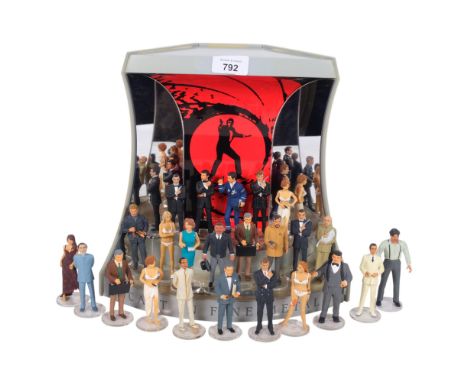 A collection of Corgi Icon James Bond hand painted metal models, together with mirrored display stand, H27cm