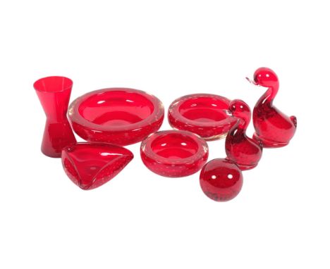 A group of ruby glass items