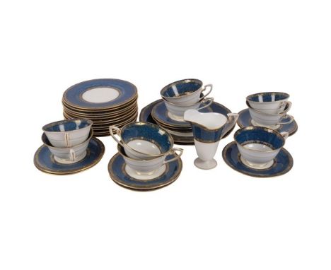 Royal Worcester bone china tea set, circa 1920s, with gilded and enamelled blue mottled borders (1 cup hairline crack and lac