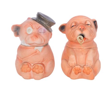 2 Bonzo bisque tobacco jars, 1 German late 1920s, together with drunk and punched eye example from 1930s, tallest 14cm, from 