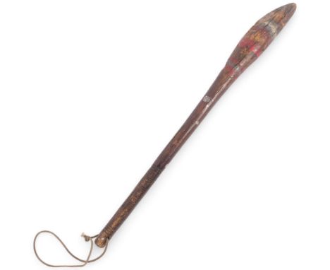 An Aboriginal Nulla Nulla (Waddy) war club, with traces of paintwork and carved grip, 56cm
