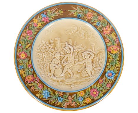 A large Austrian majolica charger with markings for Shutz, Cilli, 598, 16. Diameter 45.5cm.