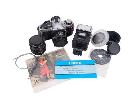 A Canon AE-1 Programme camera, with a Canon FD 50mm 1:1.8 lens, Hoya filter, a flash unit, a Canon Macro 1:5 lens with Hoya f