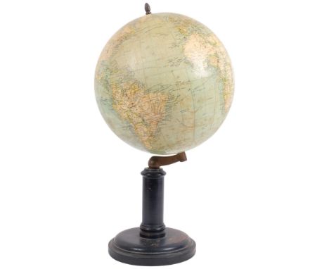 A Vintage desk globe metrique by E Bertaux, on original ebonised turned wood base, globe diameter 25cm