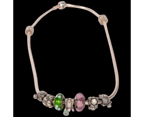 PANDORA - a sterling silver snake link charm necklace, with 7 charms and 2 spacers, 41cm, 54.4gNo damage or repair, only ligh
