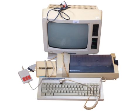 A Vintage Amstrad PCW8256 green monitor, keyboard, printer, etc