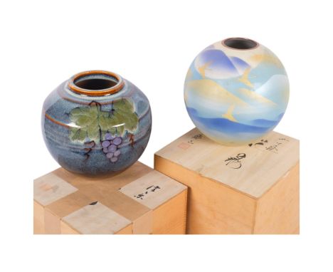 A signed Japanese glazed ceramic globular vase, with grapevine design, H19cm, another with flying cranes, both boxed