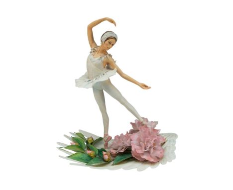 A limited edition exquisitely delicate figurine titled As Seen Through The Eyes Of A Butterfly. She is en pointe in an ecarte
