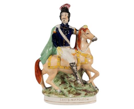 A hand painted figure of the first president of France, and the last monarch of France. Bright colors of blue, green, peach, 