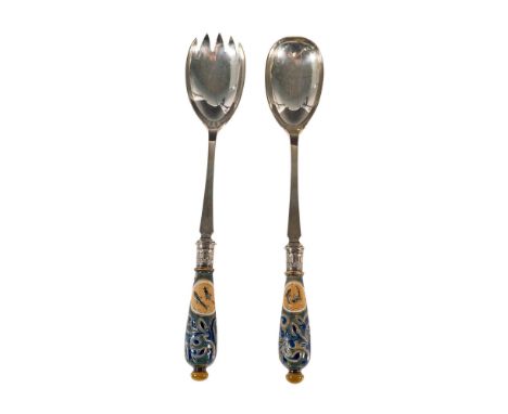 A pair of silver plated salad servers; the handles decorated with fish and incised foliate. Fork: 11"L x 2"W x 1"H. Spoon: 11