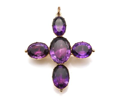 A Georgian graduated amethyst cruciform brooch/pendant,with an oval Lisbon cut amethyst in a dome back cut down collet at the