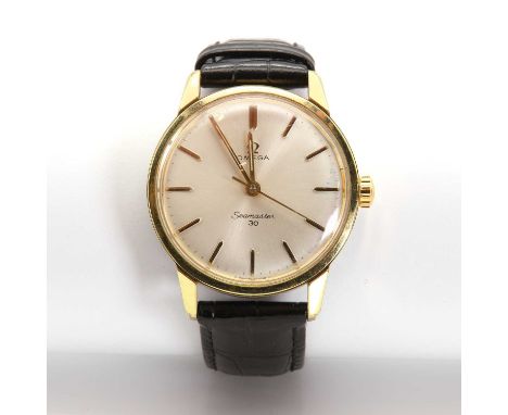 A gentlemen's gold plated Omega 'Seamaster 3D' mechanical strap watch,with a 35mm case, 135.007.64. A silvered dial with rais