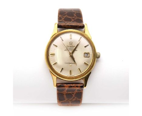 A gentlemen's 18ct gold Omega automatic chronometer 'Constellation' strap watch,with a circular 33.90mm case, silvered dial, 
