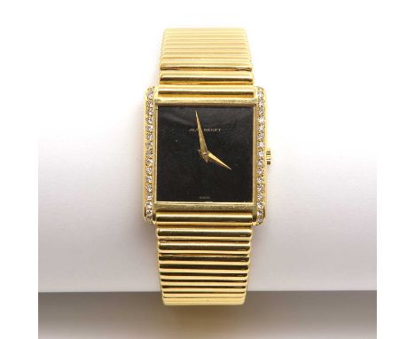 A gentlemen's 18ct gold Jean Renet diamond set mechanical bracelet watch, c.1980,with rectangular case 24.80mm wide. A black 