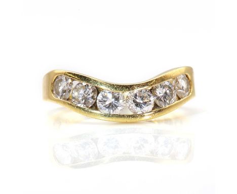 An 18ct gold diamond set wave head half eternity ring, by Boodle and Dunthorne,with a row of brilliant cut diamonds, channel 