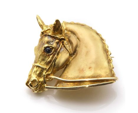 An 18ct gold horsehead brooch, by Harriet Glen, with a satin finish and polished accents, and cabochon sapphire set eyes, to 