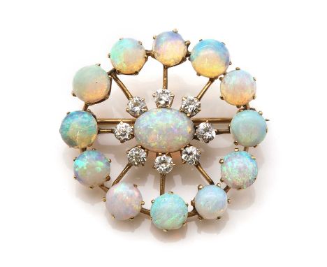 An Edwardian gold, opal and diamond brooch,an oval cabochon opal claw set at the centre, to a surround of old European cut di