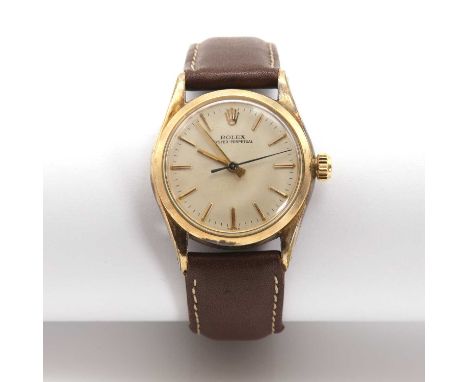 A gentlemen's gold plated Rolex 'Oyster Perpetual' automatic strap watch, 6546, c.1957,with a 30mm case. A silvered dial with