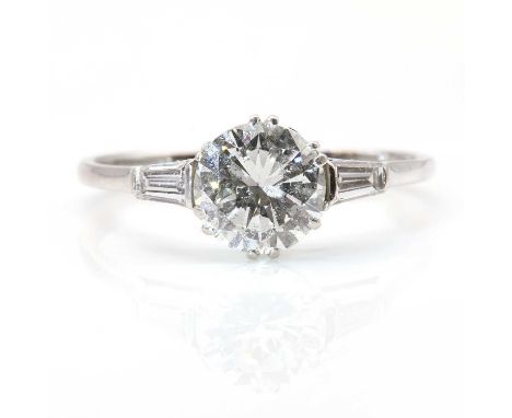 A single stone diamond ring,with a brilliant cut diamond, estimated as approximately 2.20ct, double claw set in a coronet col