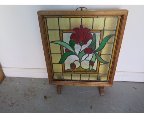 A stained glass fire screen - Height 73cm x 61cm - in good condition 