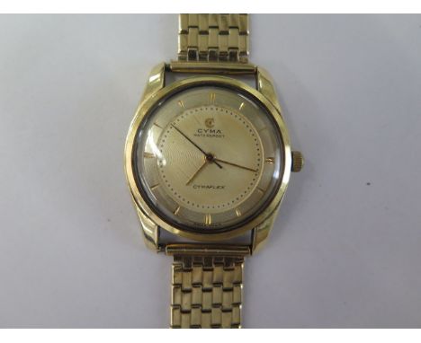 A Cyma Watersport Cymaflex manual wind gold plated wristwatch on a 9ct yellow gold bracelet strap - 33mm case - total weight 