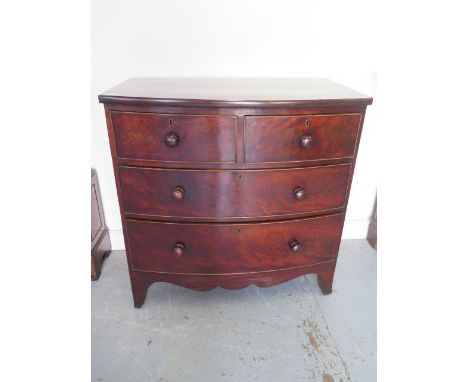 A Georgian mahogany four drawer bow fronted chest on bracket feet - Height 91cm x 89cm x 50cm 