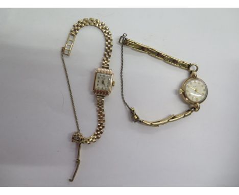 A 9ct manual wind ladies wristwatch on 9ct strap - approx weight 13 grams - running - and a 9ct watch on metal core 9ct strap