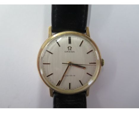 An Omega 9ct yellow gold manual wind presentation wristwatch - 32mm case - running, some scratches - with Garrard &amp; Co Lt