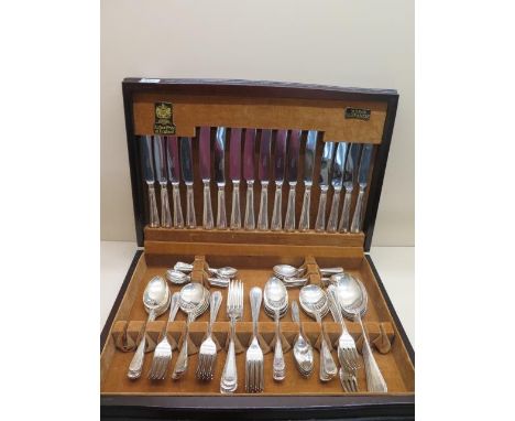 An Arthur Price eight setting canteen of plated flatware one fork has been replaced with a  silver fork - some usage but gene