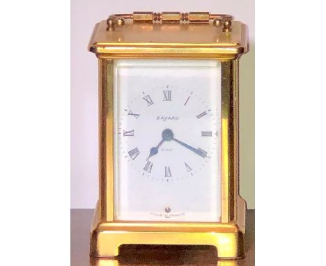 An early 20th century French carriage clock by Duverdrey et Bloquel of Bayard, circa 1930,swan neck handle above three quarte