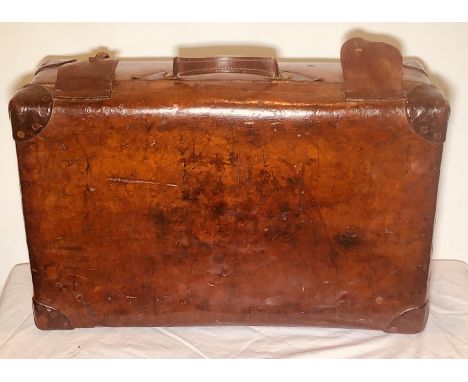 A Late 19th Century brown leather travel suitcase trunk by F. Best of London (stamped inside and engraved on brass locks), ci