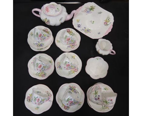 Shelley tea service of twenty eight pieces in the Wild Flowers pattern. No damages, some staining to teapot interior. Not ava