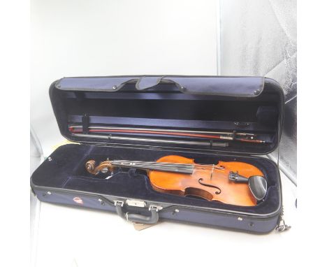 Cased 4/4 violin, with Stradivarius Faciebat 1750 label to inner, one piece back, with sound post present and in place. UK P&