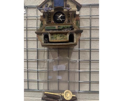 A Flying Scotsman Celebration of Steam cuckoo clock, from the Bradford Editions, in the form of a station building with minia