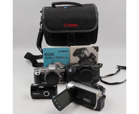 Canon EOS 600 SLR camera body and a Canon EOS 500 SLR camera body, both with manuals, Olympus Ultra Compact 35mm and Toshiba 