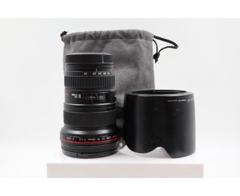 Canon EF focal lens 16-35mm USM, with Canon EW-83F lens hood and Canon lens bag. Not tested, no visible haze or fungus, all d