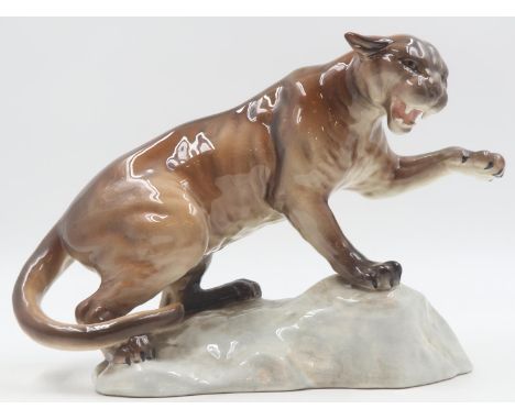 Beswick puma on a rock, no cracks or chips, L: 36 cm. UK P&amp;P Group 2 (£20+VAT for the first lot and £4+VAT for subsequent