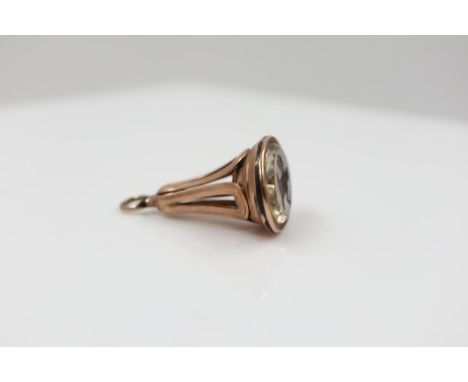 Unmarked rose gold and small Citrine fob seal with intaglio of man with sword and shield, very good condition, no visible dam
