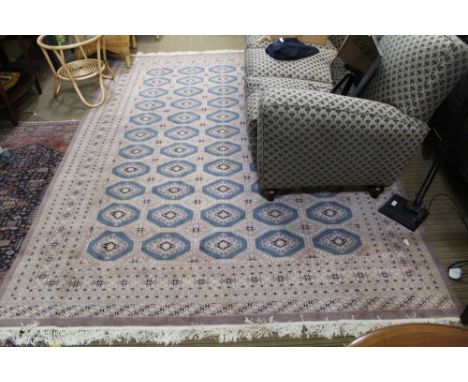 A ROOM SIZED TWO TONE WOVEN WOOLLEN FLOOR CARPET 