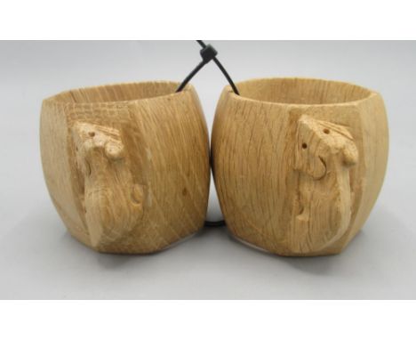Robert Mouseman Thompson of Kilburn - a pair of octagonal napkin rings, carved with signature mouse H5cm D8cm