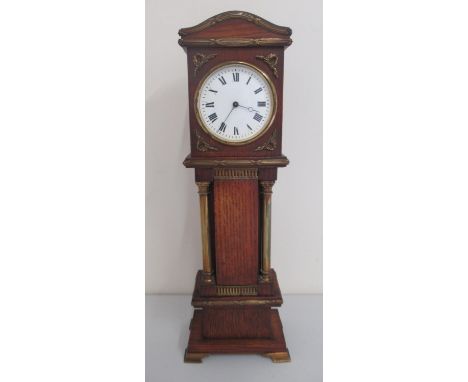 Duverdrey &amp; Bloque, 20th Century French eight day miniature oak longcase clock, applied brass reed and bow mounts, brass 