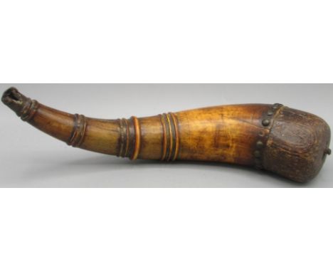 19th century cow horn powder flask, ribbed body incised decorated with naive horses, fish and birds, signed Augustin Lafleche