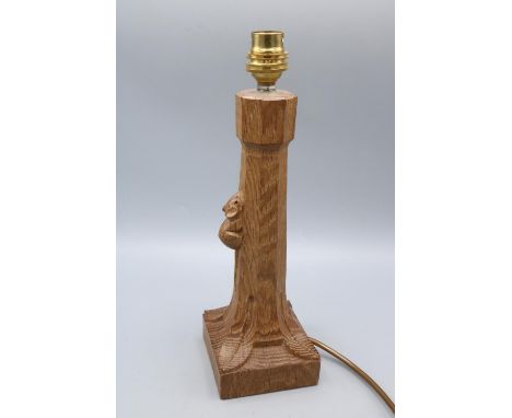 Robert Mouseman Thompson of Kilburn - an oak table lamp octagonal column on a square base, carved with signature mouse, H31cm