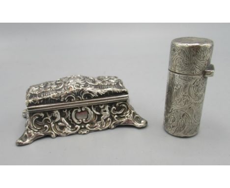 Victorian silver rectangular ring box, with hinged arched lid, all over repousse with scrolls and cartouche, by William Comyn